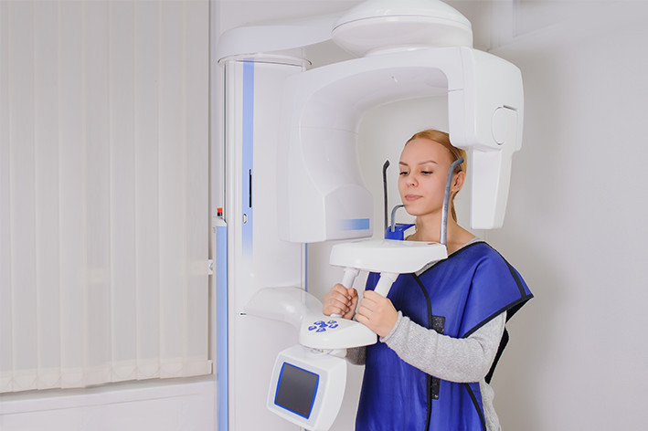 Panoramic X-ray system Planmeca ProMax 3D in dental treatment